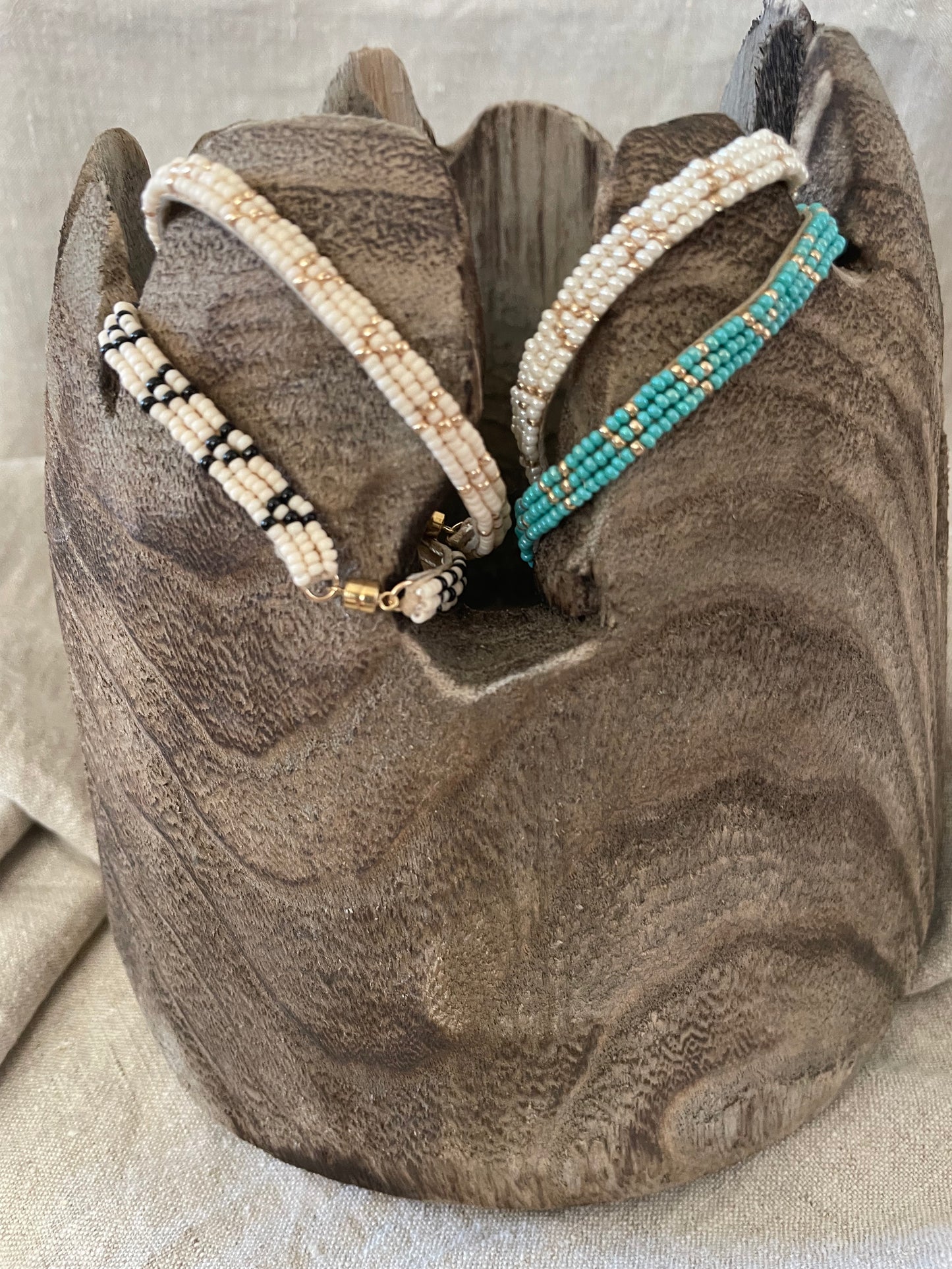 Pembetatu armband ecru/zwart