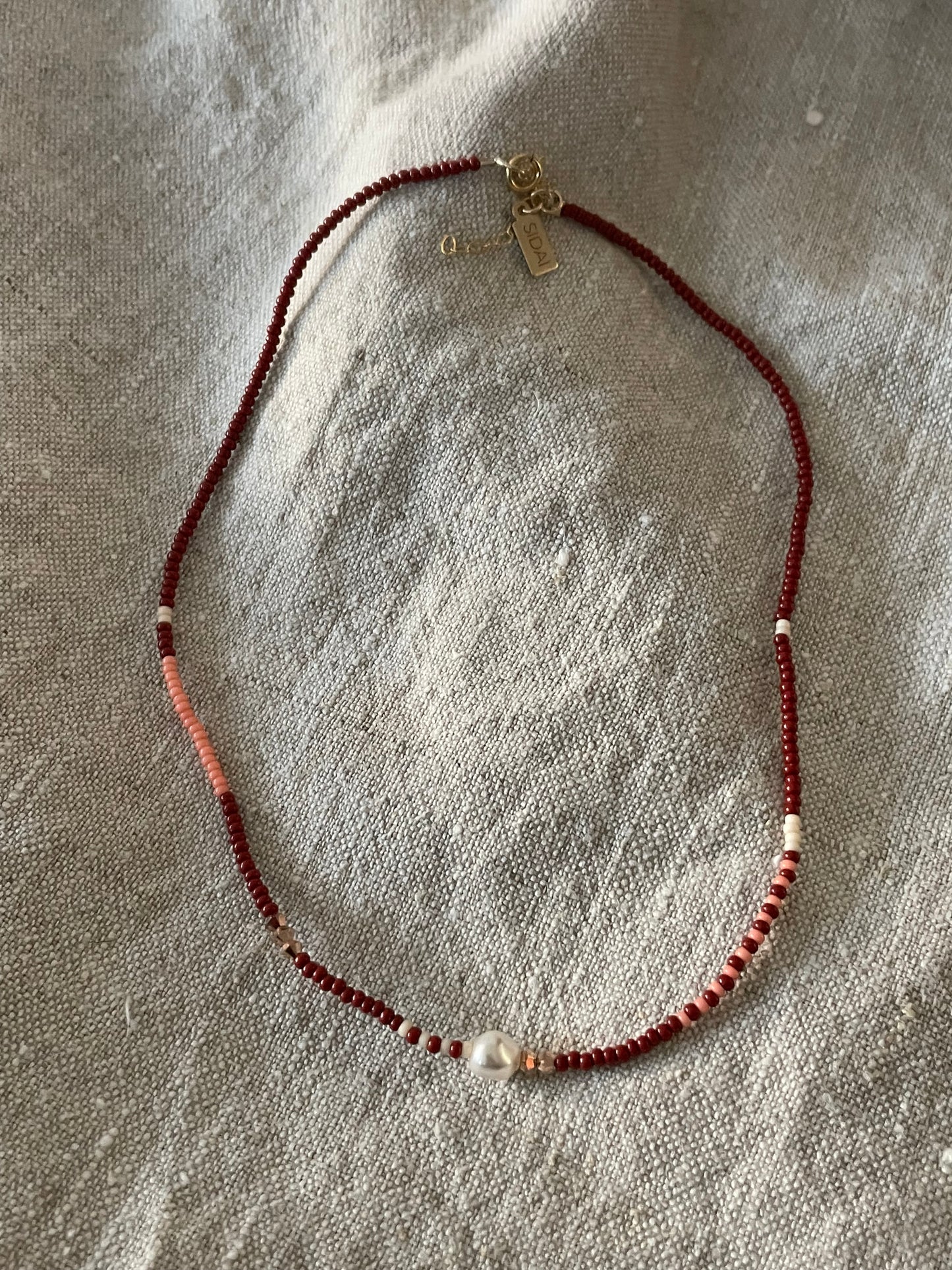 Zebra pearl crystal necklace dark red